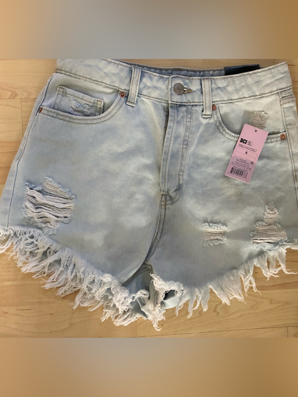 Light Blue Distressed Denim Shorts - Women's Brand new with Tags.